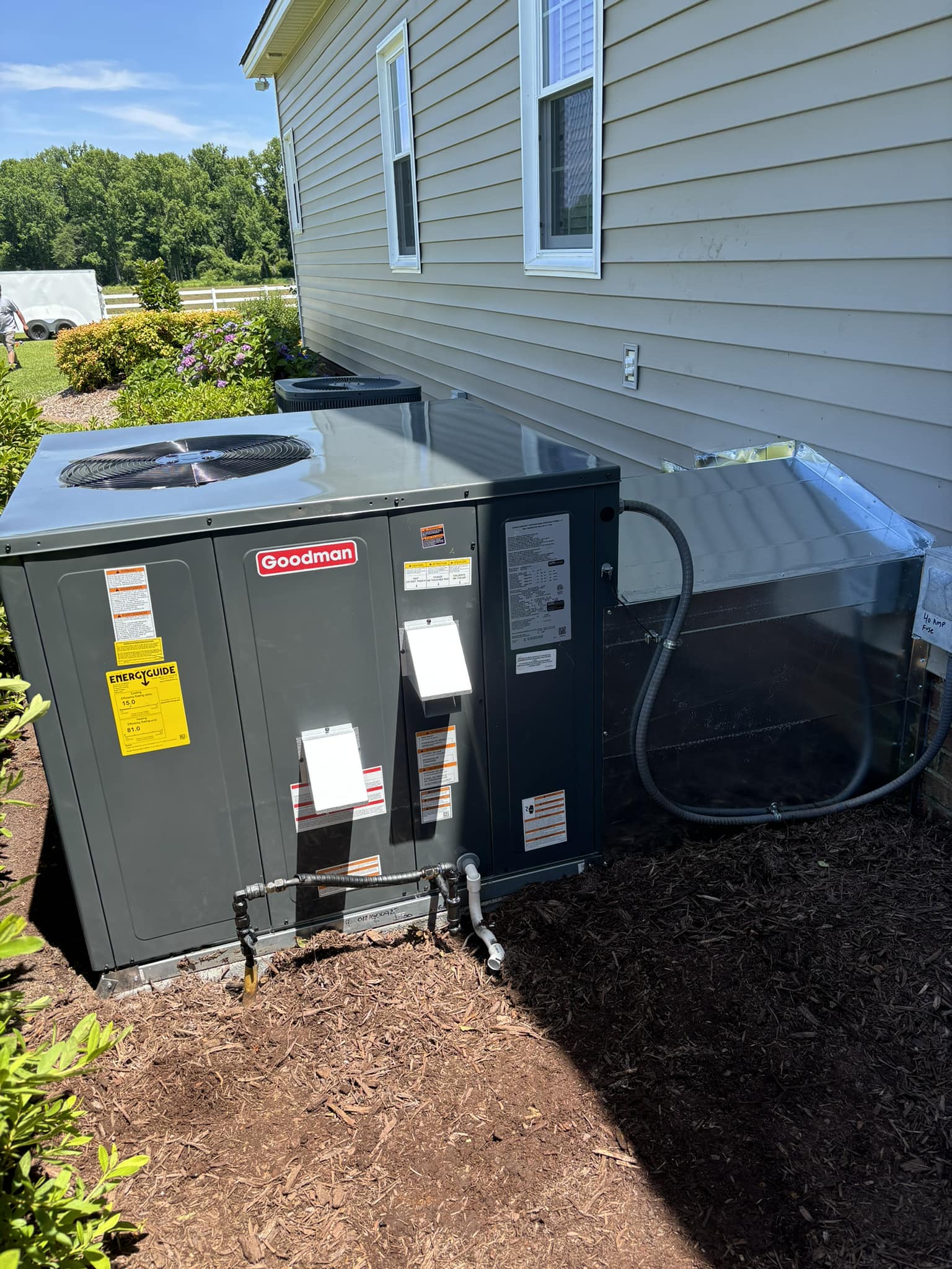 HVAC system installation — Goodman condenser units